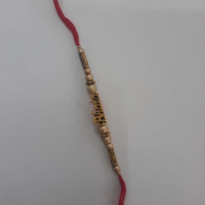 Rakhi with bhaia engraved on it.